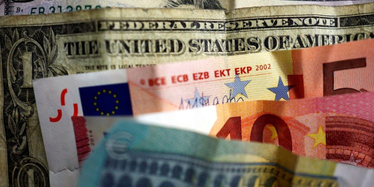 Dollar gains on tariffs fears; euro looks to ECB meeting